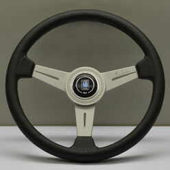 Volant Nardi Classic ND34, Cuir Noir Perforé, Branches Alu, Coutures Grises, Tulipé 40 mm