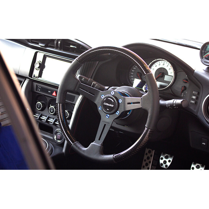 Volant GReddy "Real Carbon" Tulipé (47 mm), Carbone, Branches Noires - 340 mm